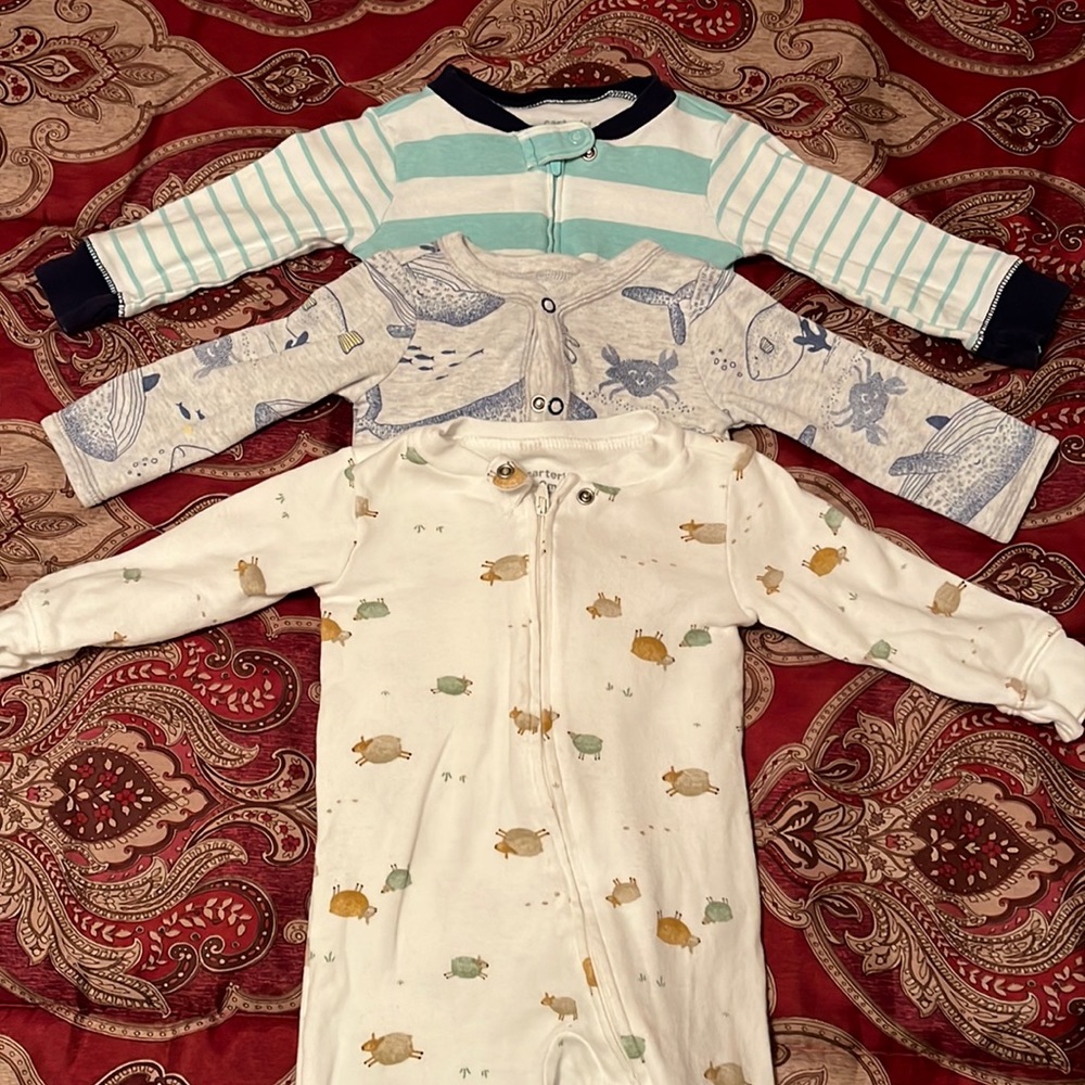3 Carter’s footed pajamas, size 9m!